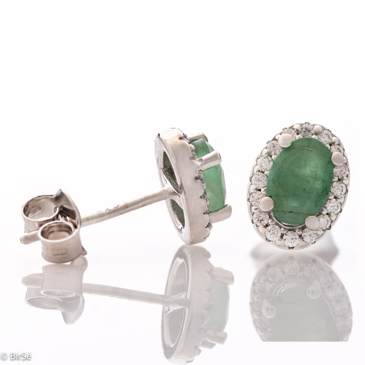 Divine Vision - Amazing silver earrings with a spectacular look and stud fastening. An elegant composition made of a fine combination of rhodium-plated silver with an exquisite emerald and dazzling zircons.