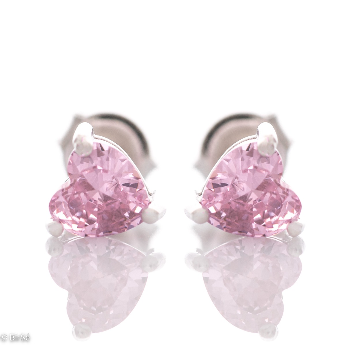 Exquisite earrings made of fine silver in the shape of a heart, in a delicate combination with an enchanted pink zircon. Fastening with a pin is for more convenience, and the earrings are a suitable gift for the beloved girl.