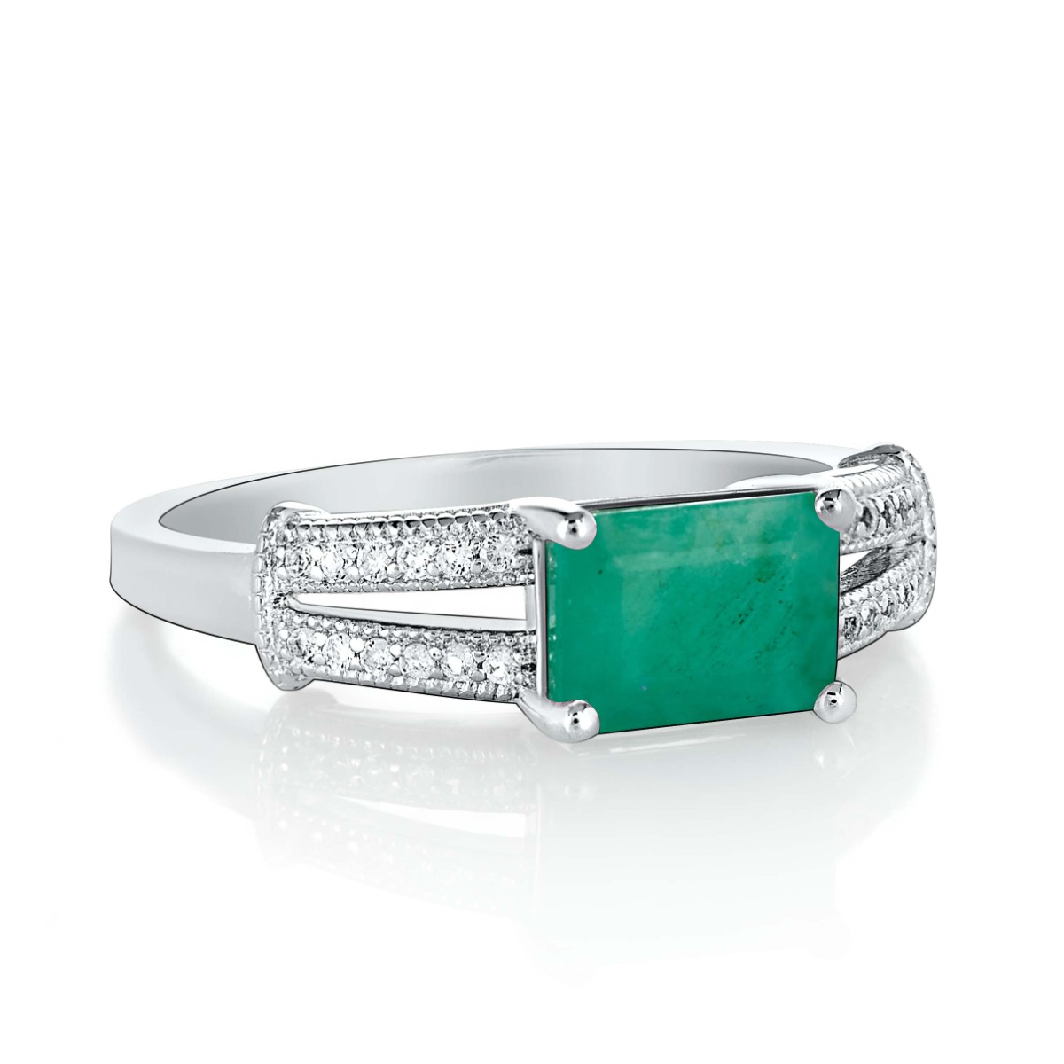 Delicately elegant silver ring with a spectacular look and a modern baguette design. Stylish craftsmanship from a fine combination of rhodium-plated silver with natural emerald and sparkling zircons.