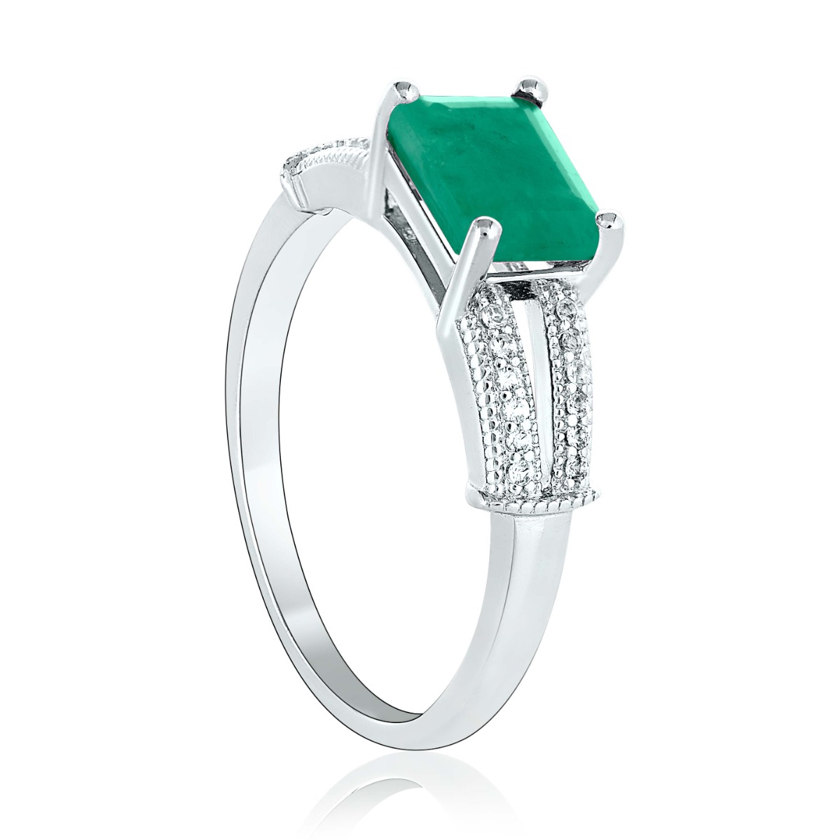 Delicately elegant silver ring with a spectacular look and a modern baguette design. Stylish craftsmanship from a fine combination of rhodium-plated silver with natural emerald and sparkling zircons.