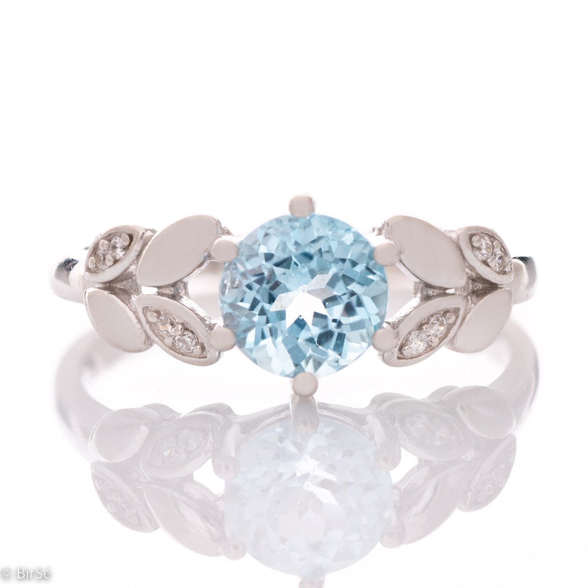 Charming Silver Ring with Magnetic Round Blue Topaz and Zirconi Leaves 1,00 ct.