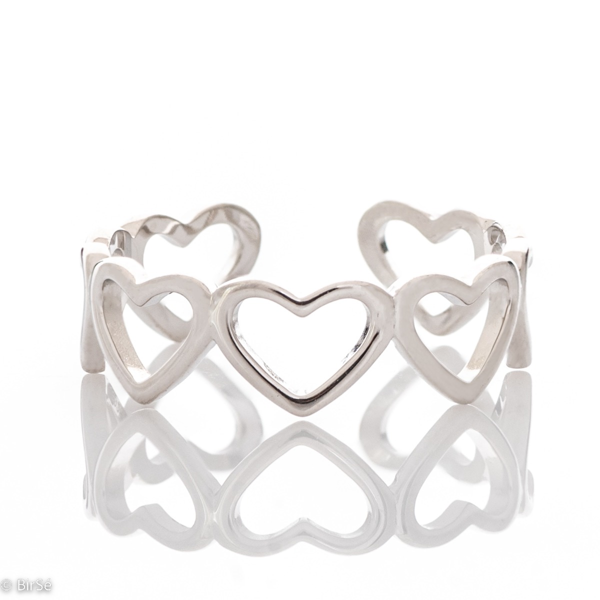 A charming ring, made entirely of soft rhodium-plated silver. A row of dainty hearts form the ring, which is open type and allows for partial size adjustment.