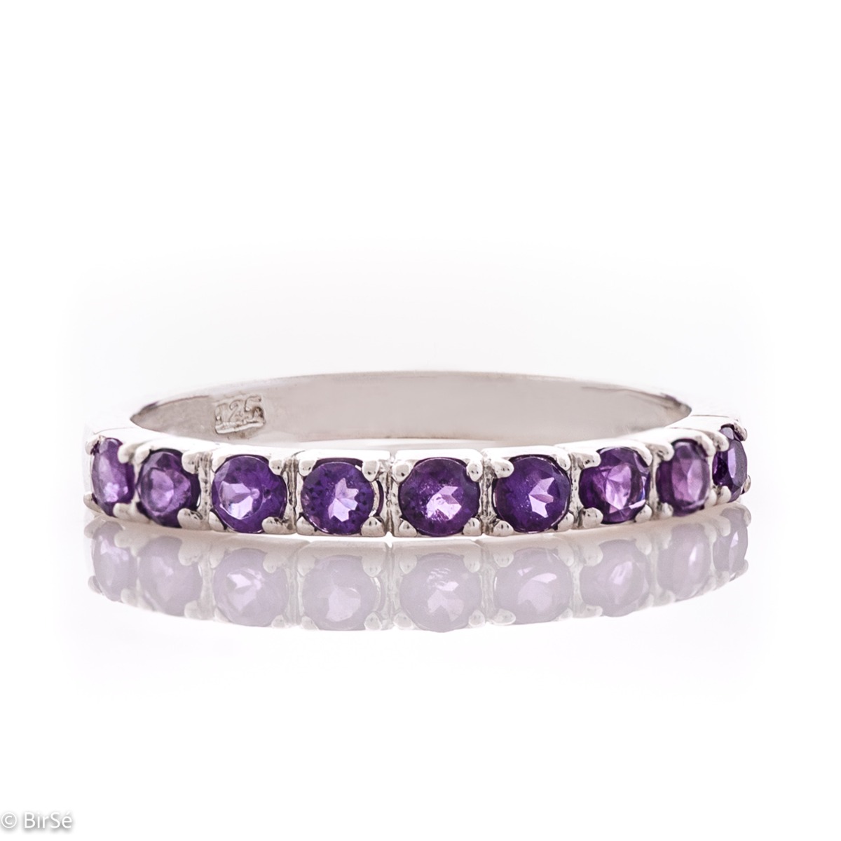 Delicate tempting ring in fine rhodium silver with a row of lovely amethyst stones.