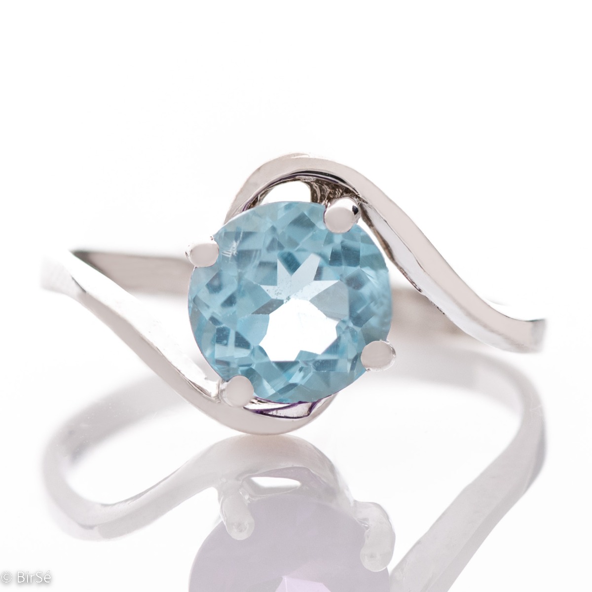 Delightful Silver Ring Design with Gentle Curves and Magic Blue Topaz 1,55 ct.