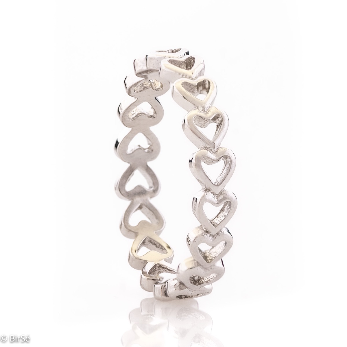 A charming silver ring in classic shiny silver with a row of delicate clean hearts. The ring can be successfully combined with earrings and a necklace with a heart.