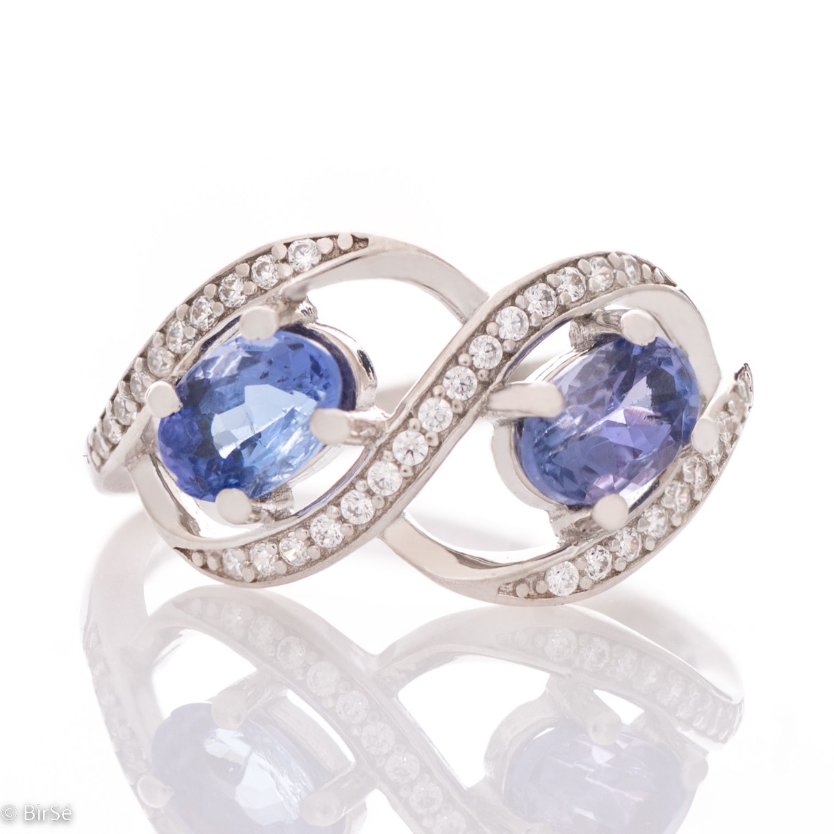 Delightful Ring with Infinity of Silver, Zircons and Natural Tanzanite 0,40 ct.