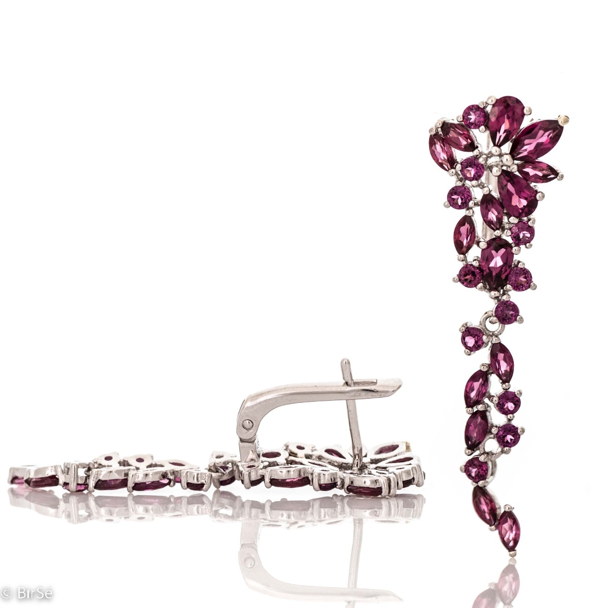 In these royally elegant rhodium silver earrings, captivating rhodolite stones gently intertwine with silver.