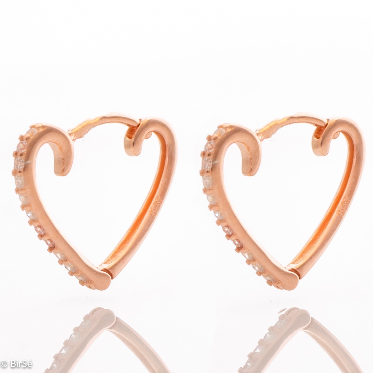 Extremely elegant women's heart-shaped earrings made entirely of rose silver and sparkling zircons. The clasp is an English type - secure and comfortable for ladies.