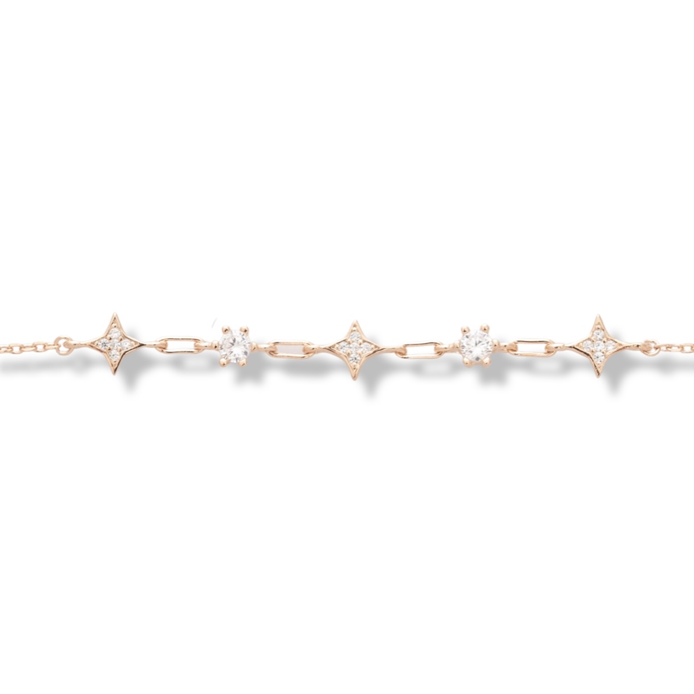 A delicately charming bracelet for stylish ladies, made entirely of beautiful rose silver, with elements decorated with sparkling zircons. An additional chain makes it possible to adjust the size of the jewelry.