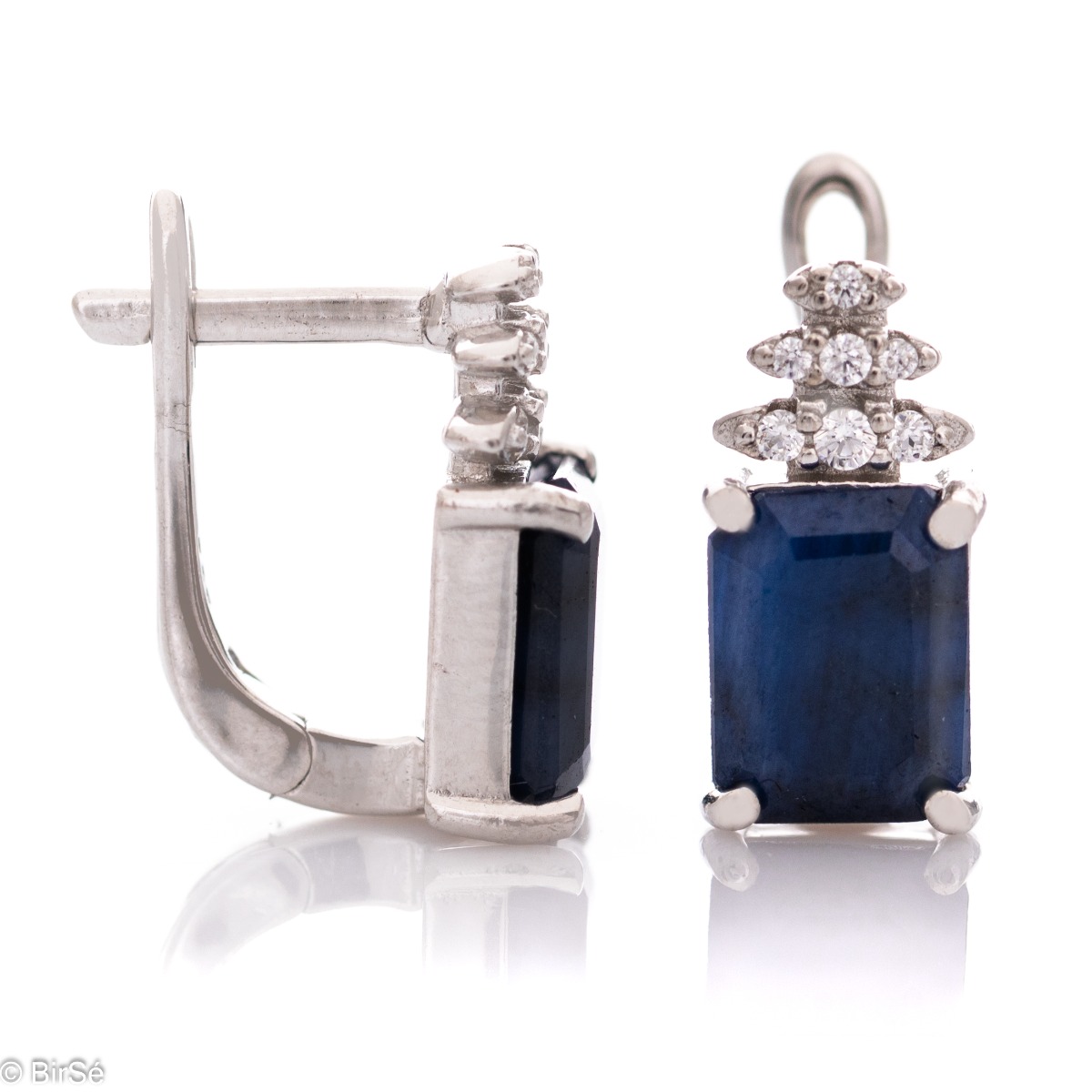 Elegant women's earrings with a spectacular design. Crafted entirely from rhodium-plated sterling silver, a natural baguette-shaped sapphire and sparkling cubic zirconia, with the ladies' favorite English clasp. In a sophisticated ring and pendant set in 