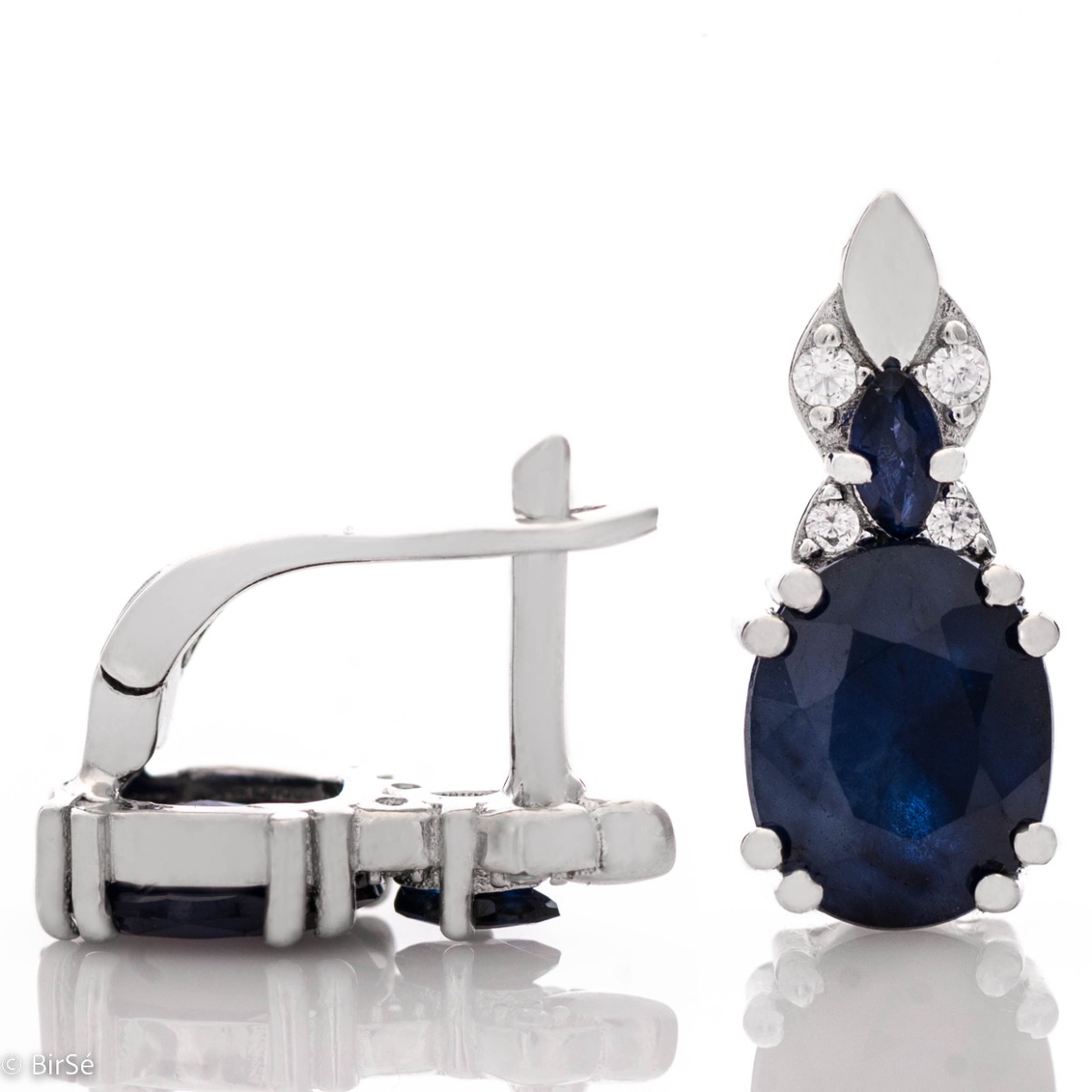 Add style to your look with the elegant design of rhodium silver earrings with natural sapphire. They suit any face type, hair color and you can match them with a ring and pendant from the same collection.