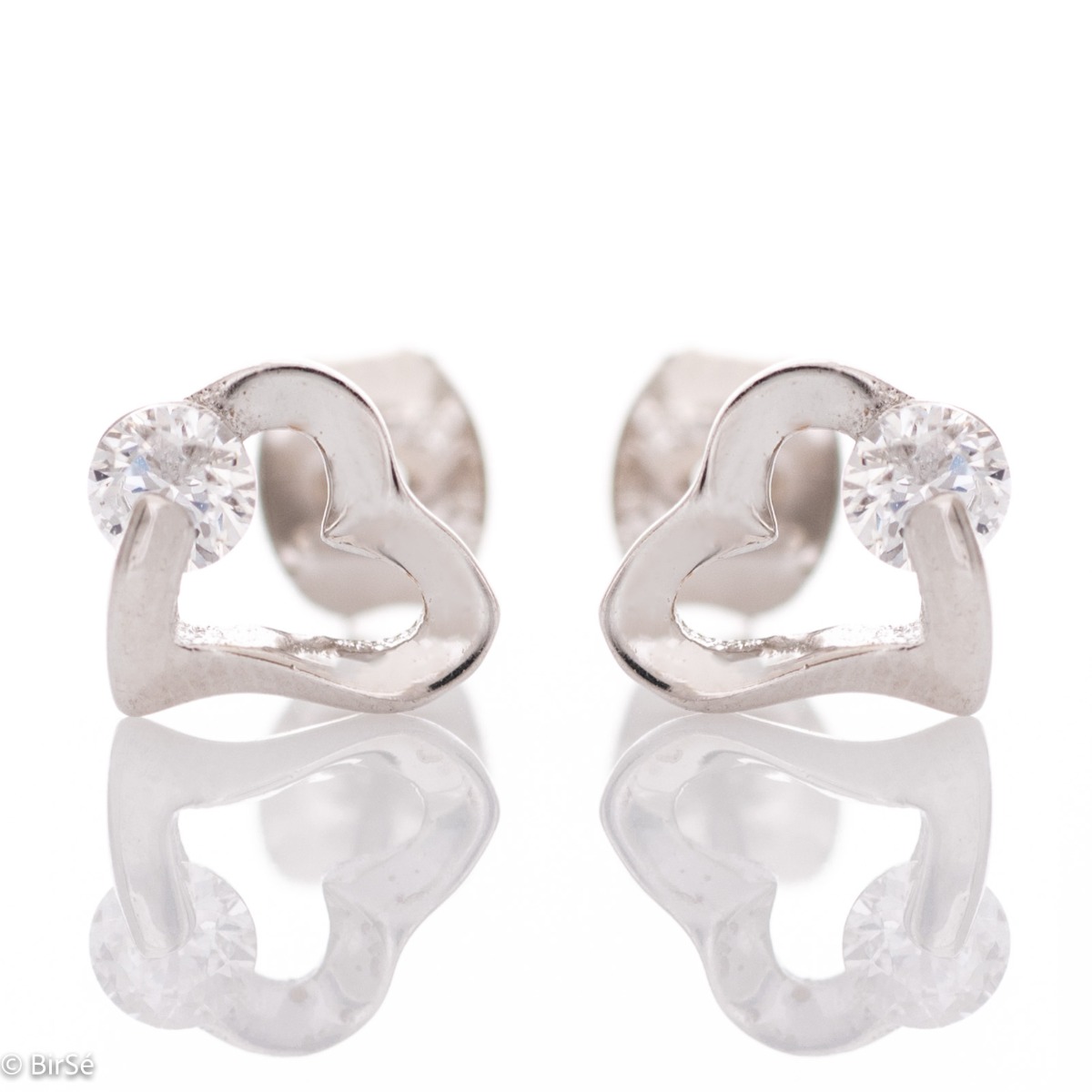 Brilliant craftsmanship of delicate earrings with charming design. Made entirely of rhodium-plated sterling silver, these charmingly shaped hearts have been added with sparkling zirconia for opulence.