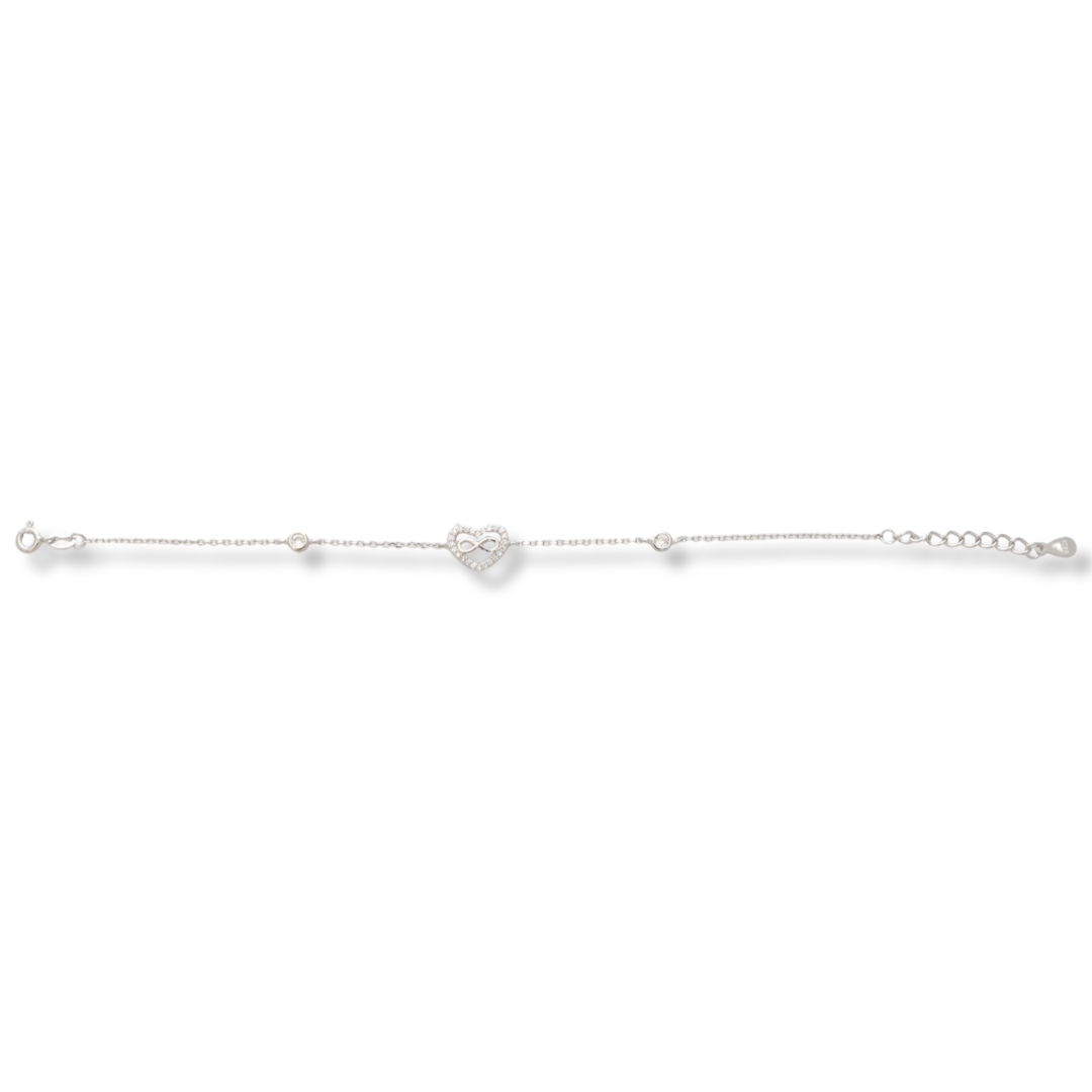 Charming women's bracelet in soft silver with an exquisitely crafted heart encrusted with sparkling zircons. A subtle infinity elegantly complements the heart. The bracelet has an extension, for more convenience when adjusting the length. A new offer from