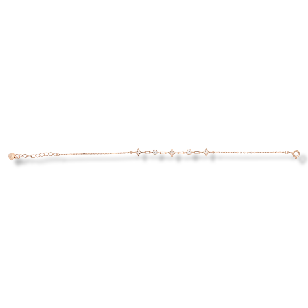 A delicately charming bracelet for stylish ladies, made entirely of beautiful rose silver, with elements decorated with sparkling zircons. An additional chain makes it possible to adjust the size of the jewelry.