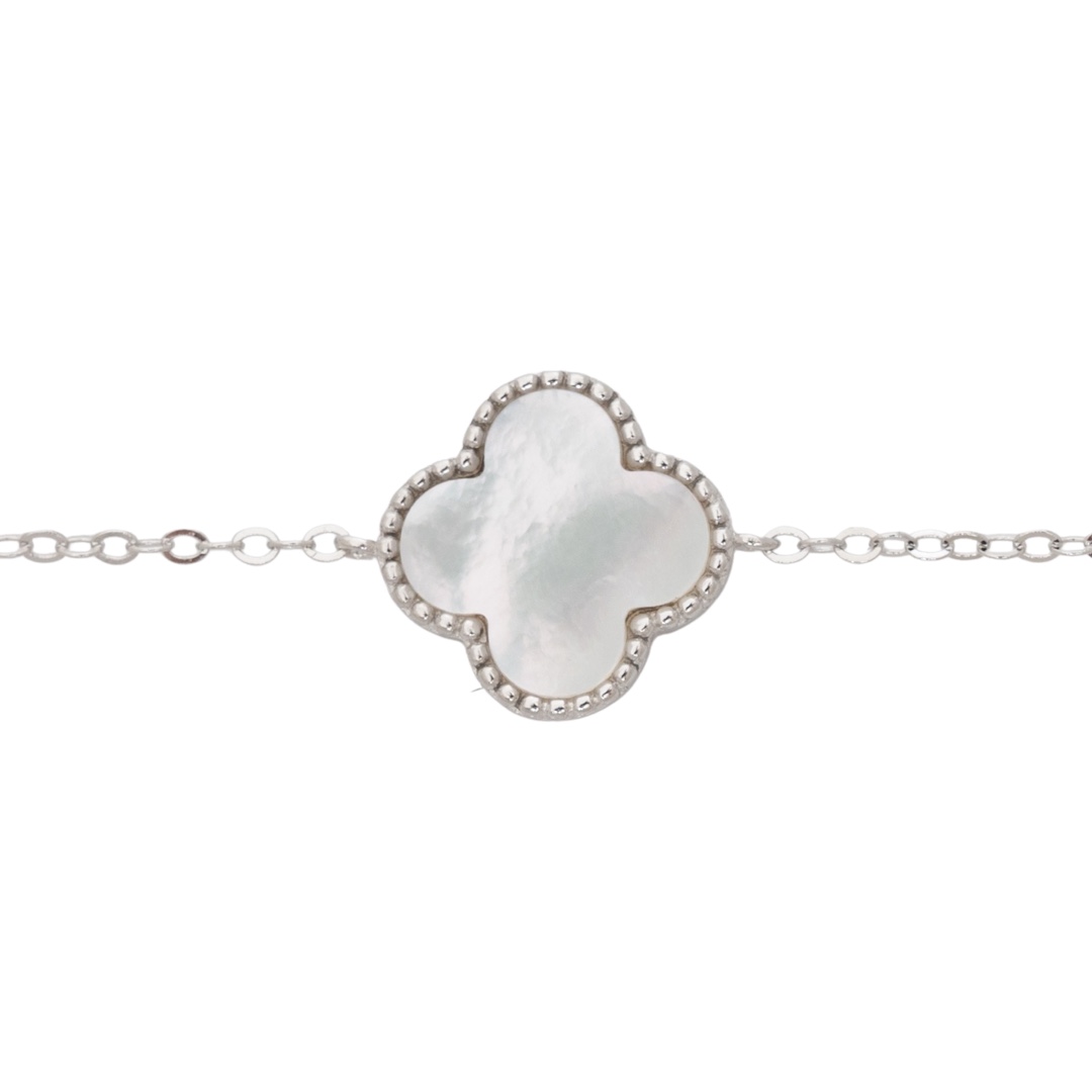 Exquisitely crafted women's bracelet of fine rhodium silver, with a beautifully shaped clover of delicate mother-of-pearl. The bracelet has an extension for convenient length adjustment.