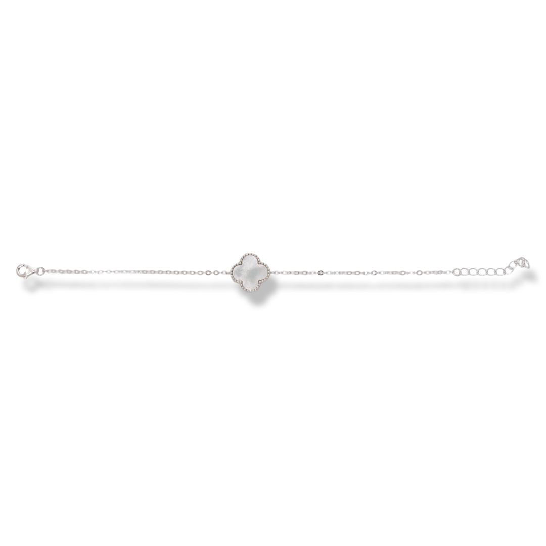 Exquisitely crafted women's bracelet of fine rhodium silver, with a beautifully shaped clover of delicate mother-of-pearl. The bracelet has an extension for convenient length adjustment.