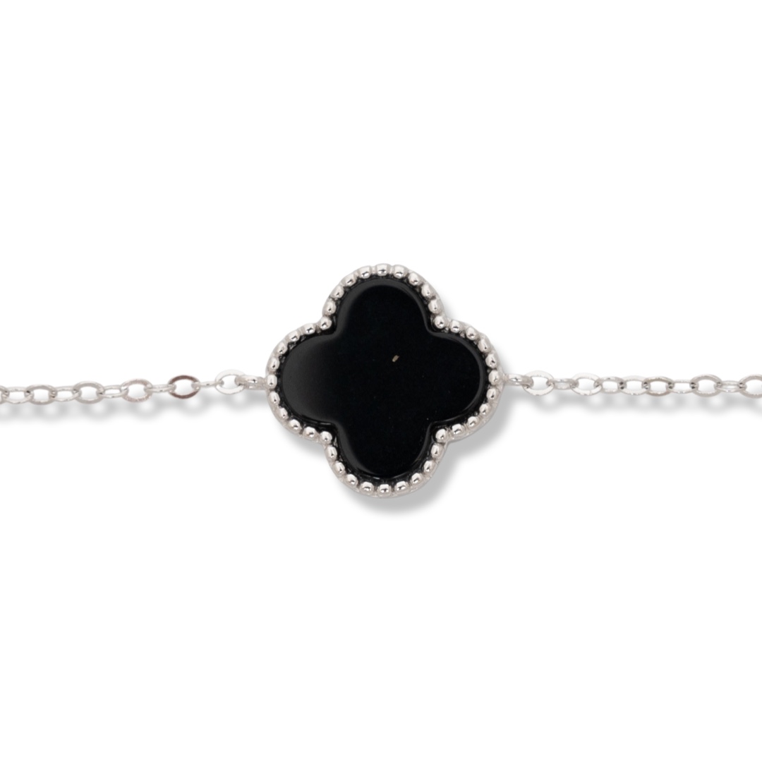 Finely crafted women's bracelet in fine rhodium silver, with a beautifully shaped magic onyx clover.