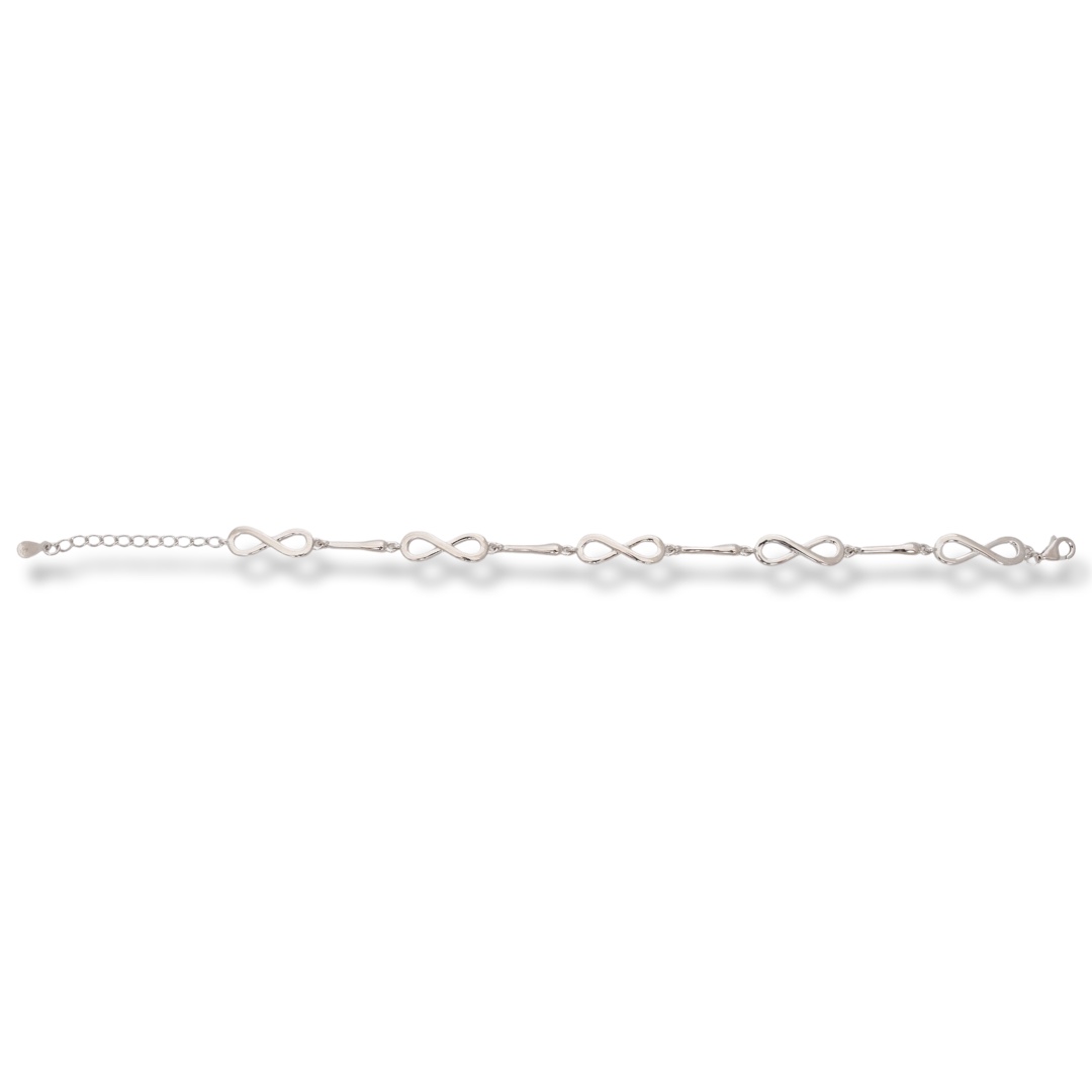 Fine and sophisticated women's bracelet with a soft finish made entirely of glittering rhodium-plated silver, combined with delicate elements of infinity. Exquisite details and clean design. The bracelet has an extension for greater convenience regarding 