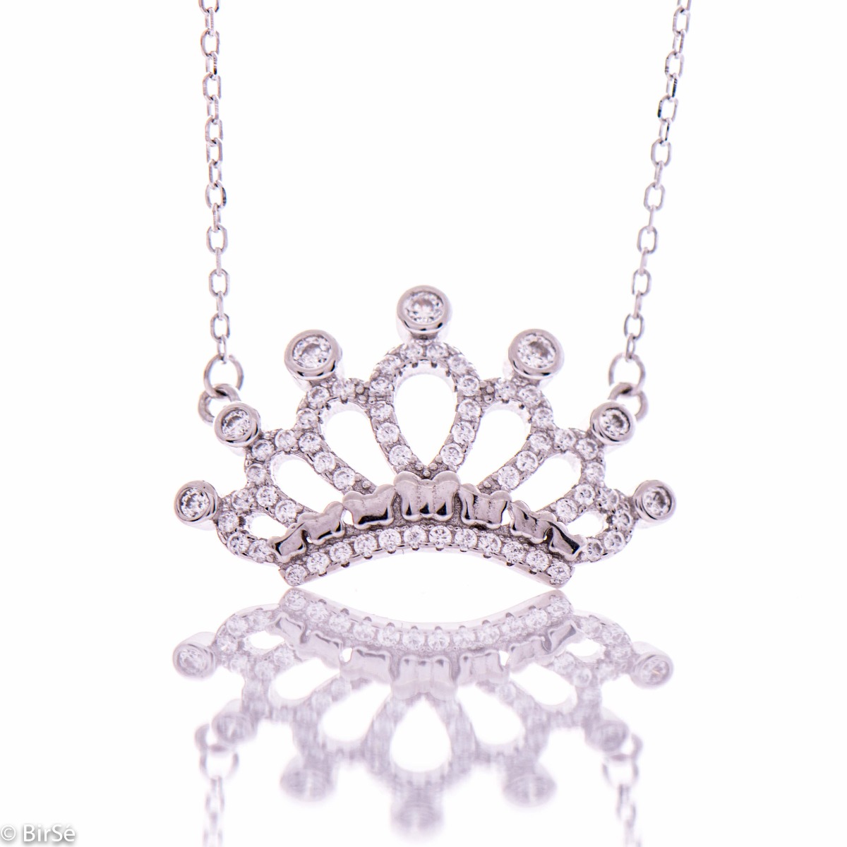 An incredible silver necklace in the shape of a royal crown. A stylish and extremely effective composition made from a fine combination of gently rhodium-plated pink and black silver with sparkling zircon stones.