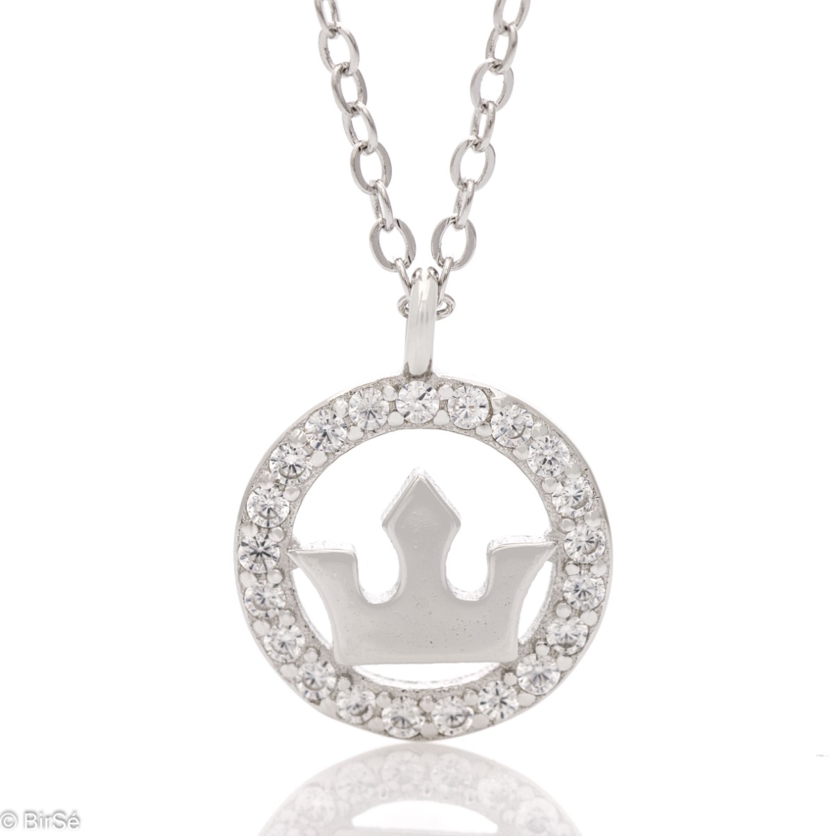 Spectacular women's jewelry made of rhodium-plated silver with an elegant crown element and a halo of zircons. A matching necklace for the princess in your life.