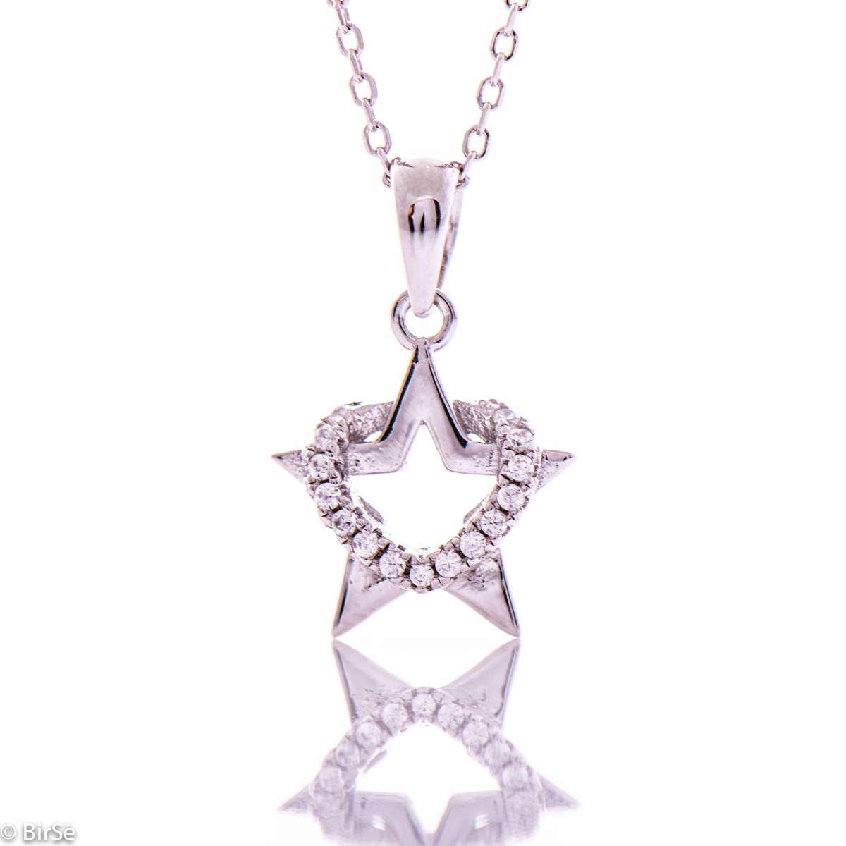 An elegant silver necklace with an accent of a spectacularly shaped star. Stylish composition made entirely of soft rhodium silver, enhanced by the shine of white zircons.