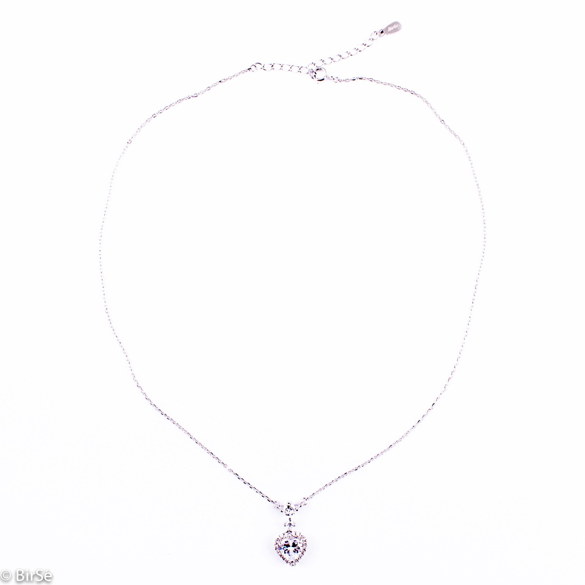 Delicate silver necklace in the shape of an exquisitely sculpted heart. A stylish work of art from a fine combination of rhodium-plated silver with sparkling zircons.