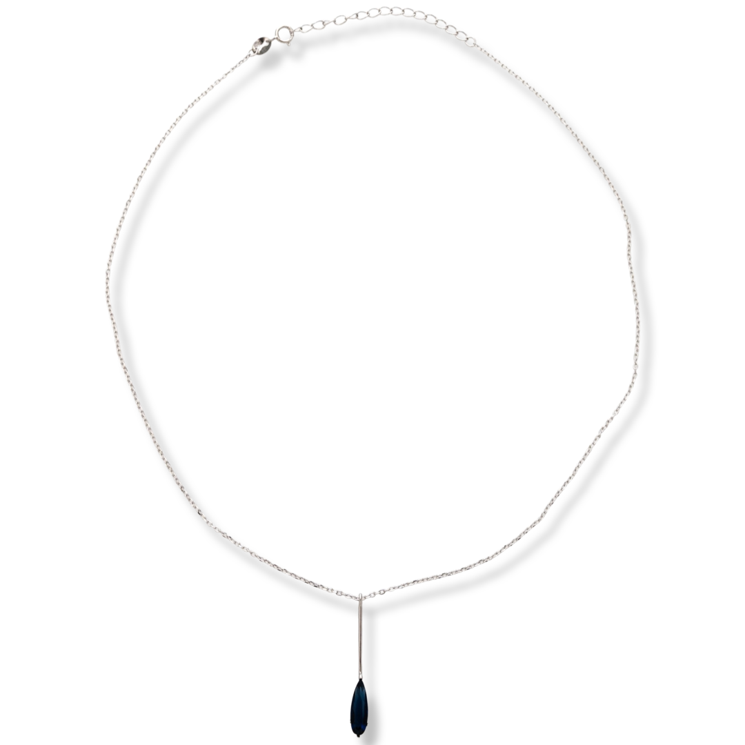 A charming delicate necklace with an elegant design, made entirely of fine rhodium silver and a beautiful blue stone. The jewelry is suitable for any occasion.