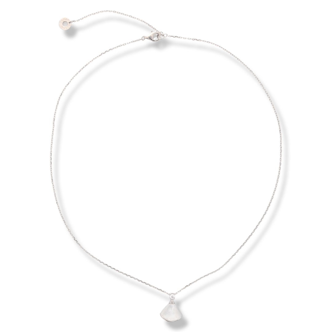 A charming delicate necklace with an elegant design, made entirely of fine rhodium-plated silver and beautiful mother-of-pearl. A dainty zircon is added to complete the perfection.