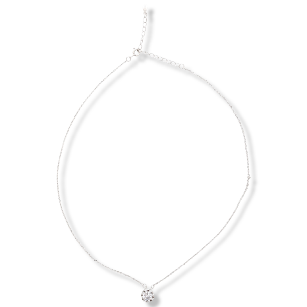 Elegant women's necklace with an exquisite design of rhodium-plated silver. The jewelry is uniquely crafted - small, delicate hearts attach a dazzling zircon, while other delicate zircons add even more sparkle and charm.