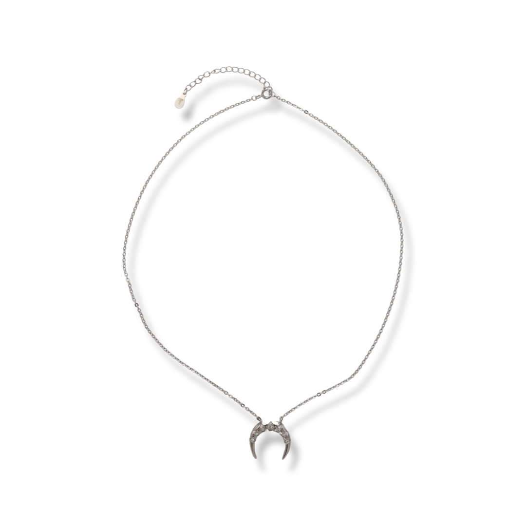 Delicate women's necklace with an exquisite design of rhodium-plated silver in the shape of a rainbow. The jewel has an elegant chain holding an element with added fine zircons. The added extension helps to adjust the length according to the client's wish