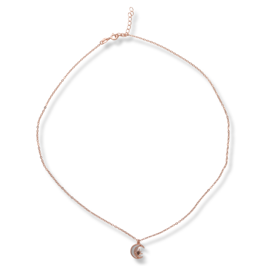 Elegant women's necklace with an exquisite design in rose silver. The jewelry is of unique craftsmanship - a gentle moon, charmingly shining in the company of a glittering star.