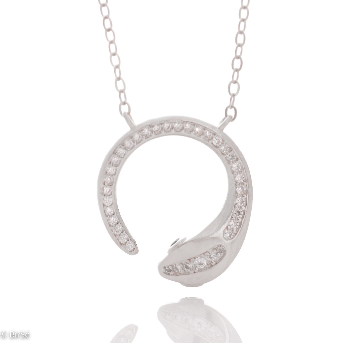 Elegant women's necklace with rhodium silver design. The piece of jewelery has a captivating craftsmanship - a delicate chain holding a delicate element in the shape of a snake, elegantly decorated with sparkling zircons.