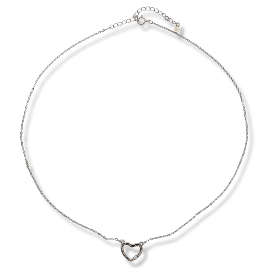 Delicate women's necklace with a charming design in rhodium silver. The piece features a delicate classic braided chain that holds a dainty heart with a dazzling cubic zirconia.