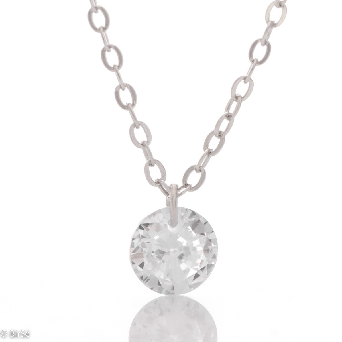 A simple necklace in sparkling rhodium silver, with a fine classic chain and an oval-shaped zircon pendant. Suitable jewelry for ladies with a stylish look.