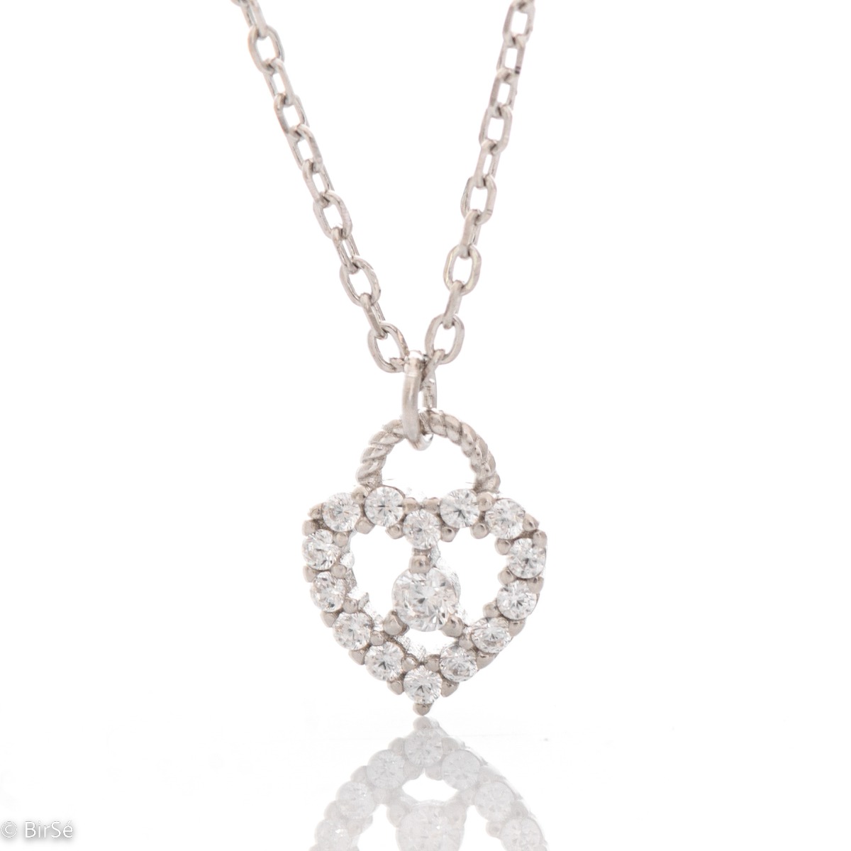 Captivating necklace in sparkling rhodium silver, with a fine classic chain and a heart pendant made of zircons. Suitable jewelry for young and loving ladies.