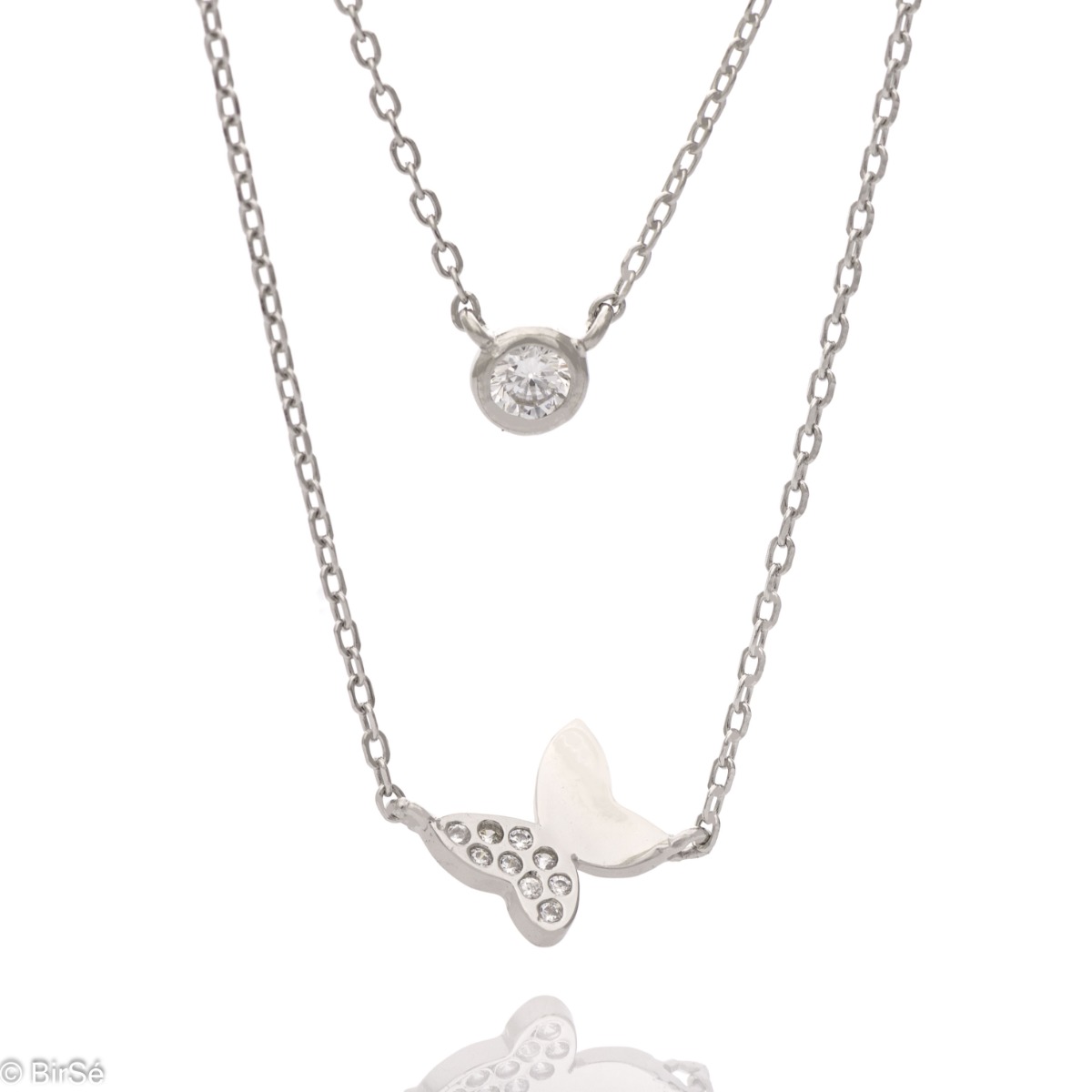 A double silver necklace with a spectacular craftsmanship entirely of rhodium-plated silver and two delicate elements of a glittering butterfly and a central zircon. All jewelry is gift-wrapped and accompanied by a certificate of quality and warranty.