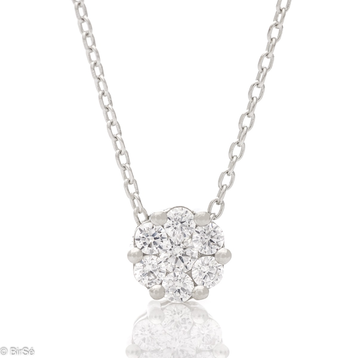 A simple, sophisticated necklace made of rhodium-plated silver and beautiful sparkling zircons, beautifully forming a flower. It is suitable for ladies who like clean lines in jewelry. It can be combined with earrings and rings with zircons. All jewelry i