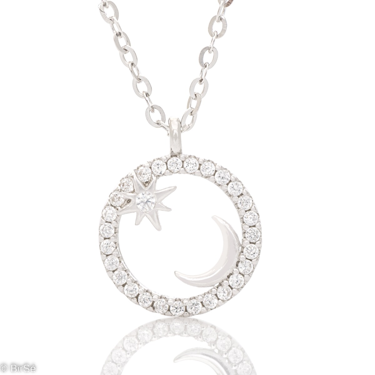 Elegant women's necklace with an exquisite design of rhodium-plated silver. The jewel has a unique design - a gentle moon, charmingly shining in the company of a glittering star, surrounded by a halo of zircons.