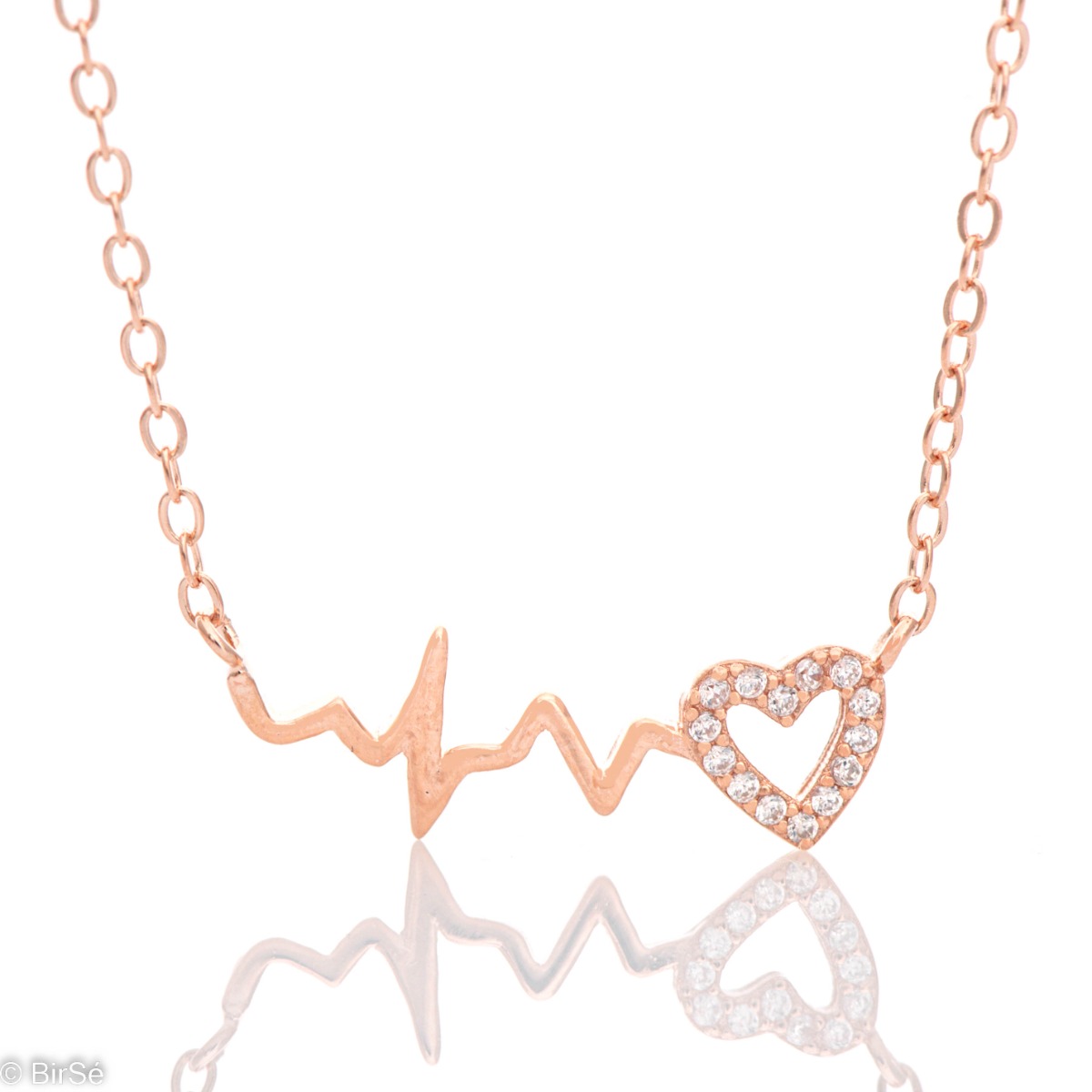 An exquisite women's necklace in fine rhodium-plated rose silver with the image of a heart with a pulse. Dazzling zircons add extra charm to the elegant piece.