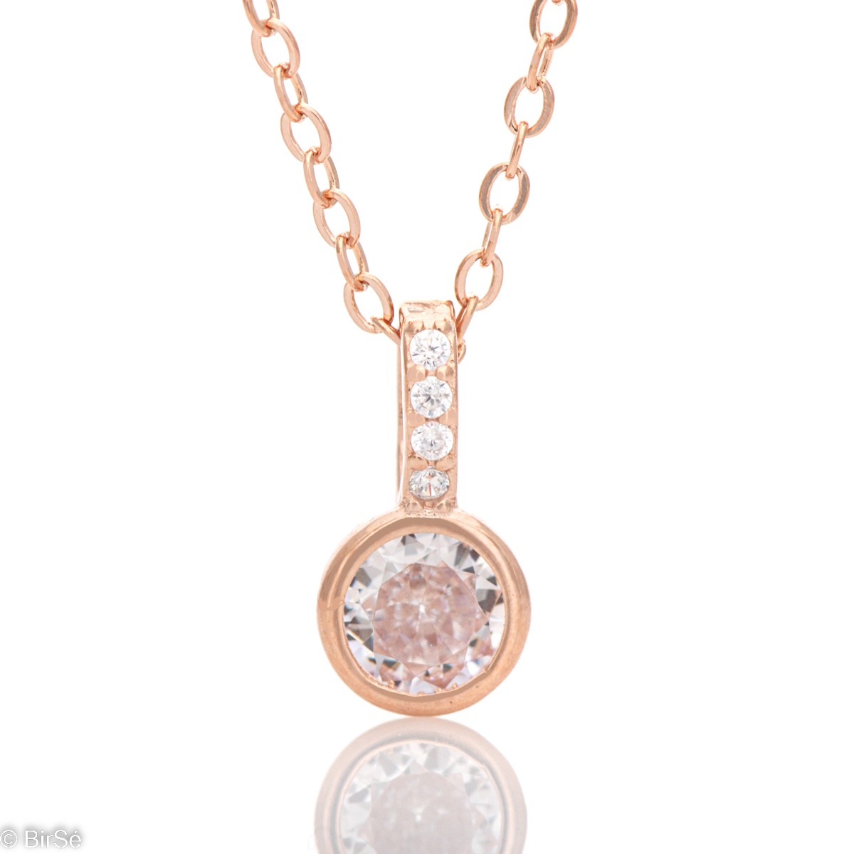 A simple, sophisticated necklace in rhodium-plated rose silver and a lovely sparkling cubic zirconia set in a pendant with other tiny cubic zirconias. It is suitable for ladies who like clean lines in jewelry.