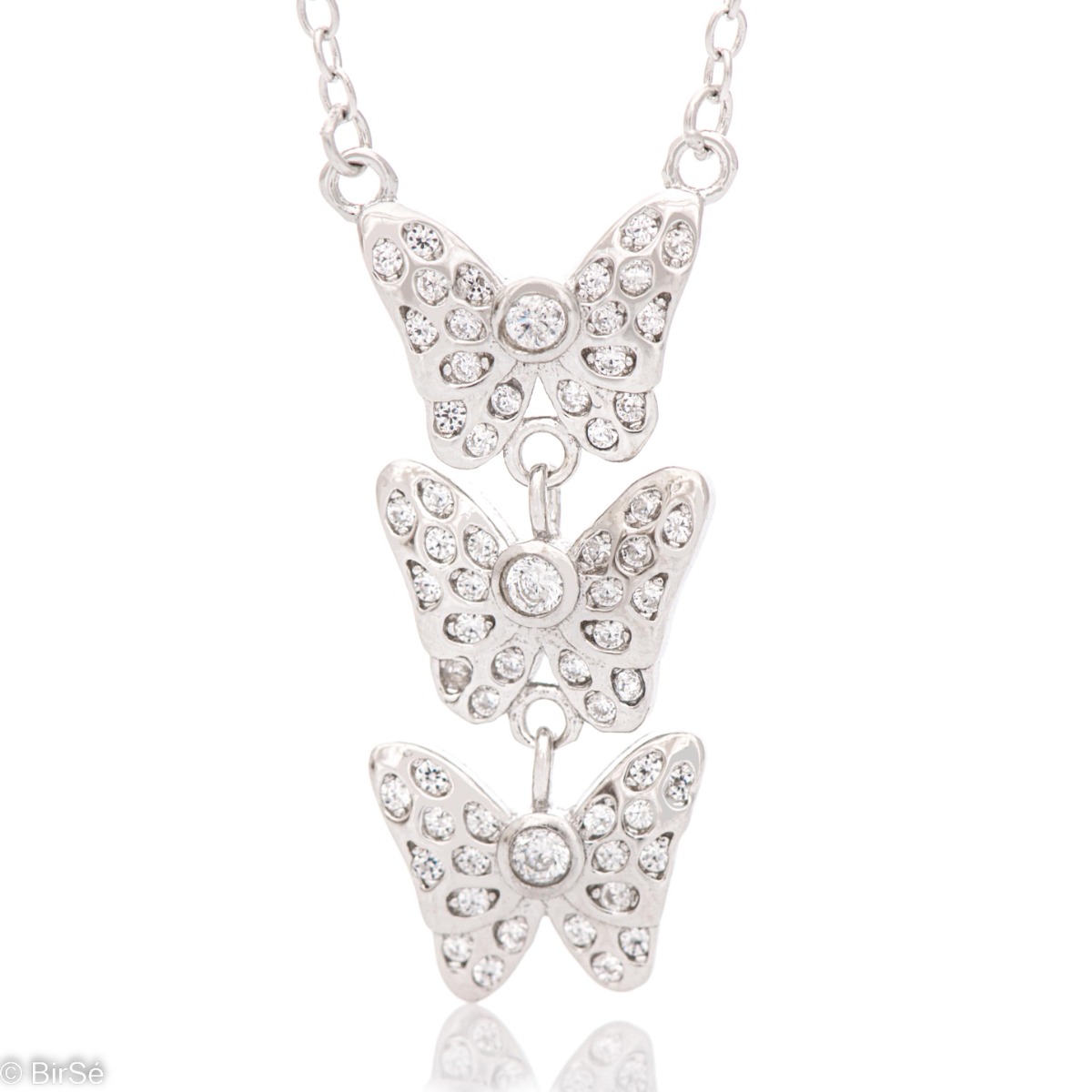 An ethereal necklace crafted in lustrous rhodium silver on a pendant of three butterflies, delicately embellished with fine cubic zirconias. The necklace is suitable for your everyday life.