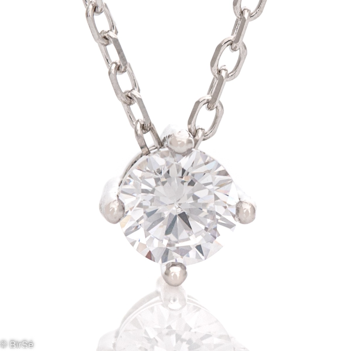 Fine women's necklace in soft rhodium-plated silver with a beautiful zircon as a centerpiece. A stylish and preferred model by every lady. The necklace has an extension of the chain, for greater convenience.