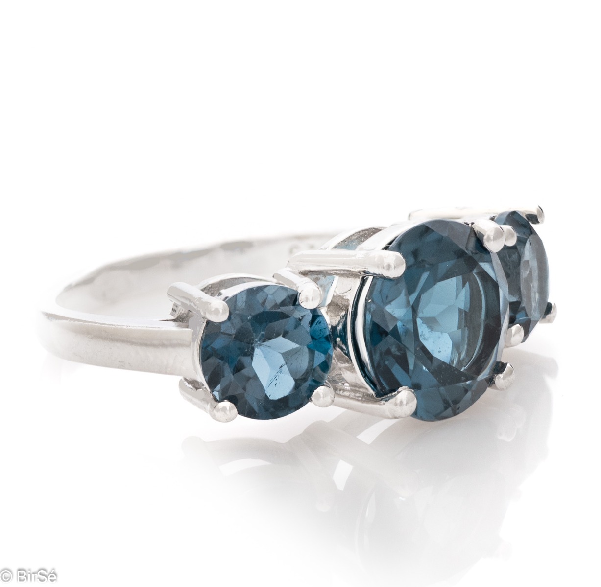 Add a touch of freshness to your jewelry box with a sterling silver magnetic London topaz ring.