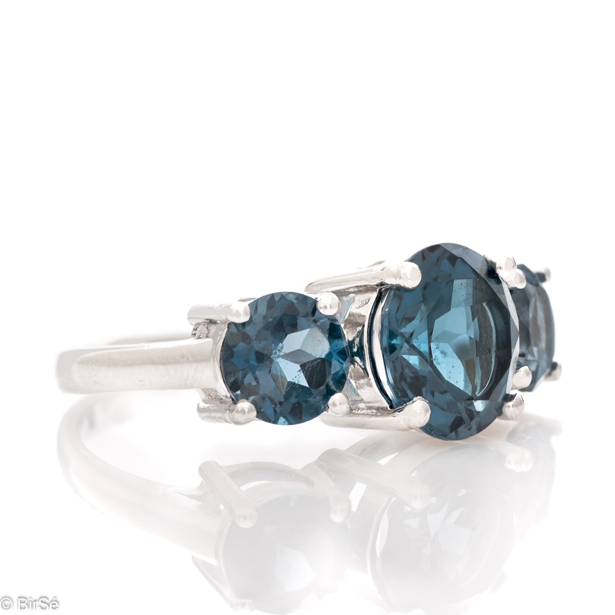 Add a touch of freshness to your jewelry box with a sterling silver magnetic London topaz ring.