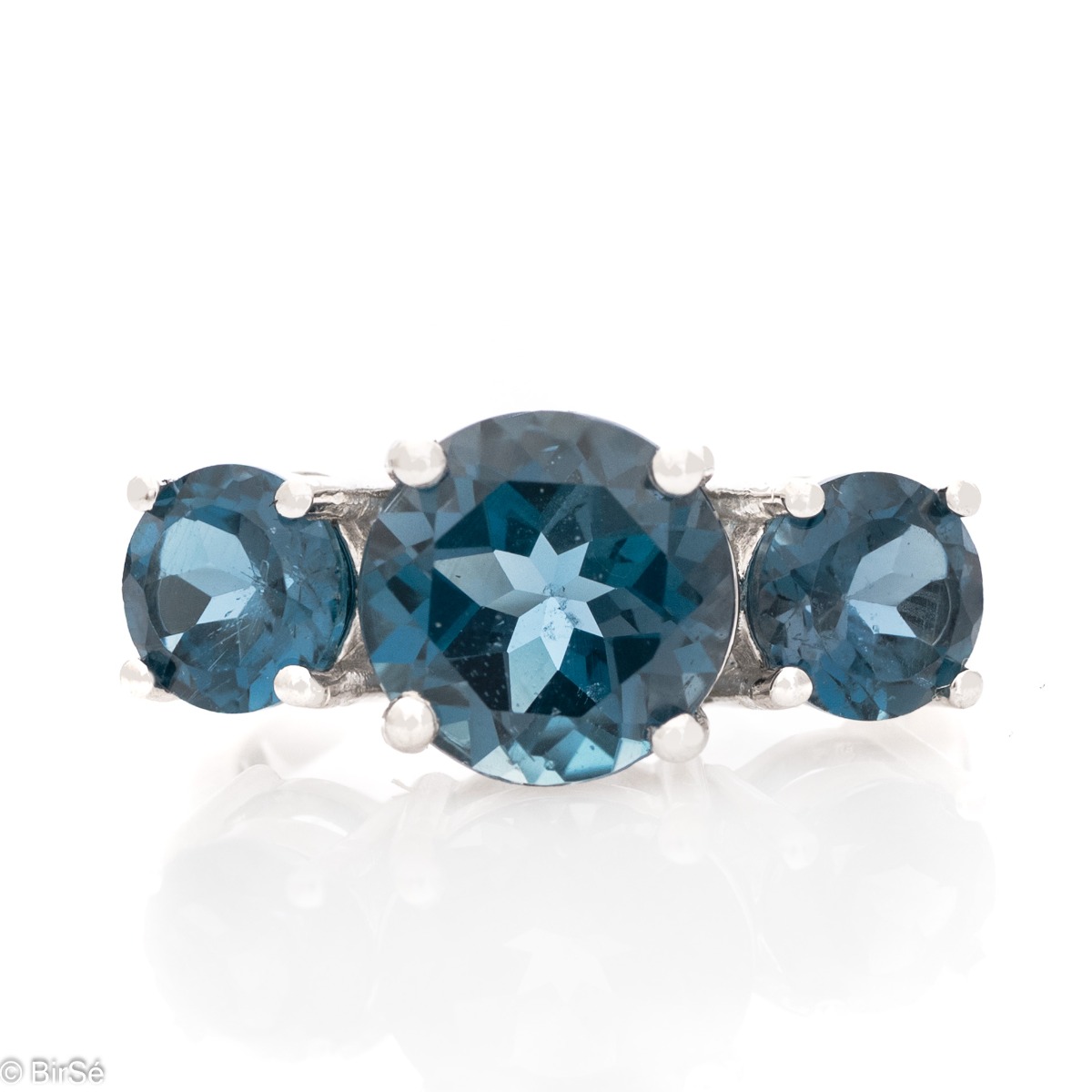 Add a touch of freshness to your jewelry box with a sterling silver magnetic London topaz ring.