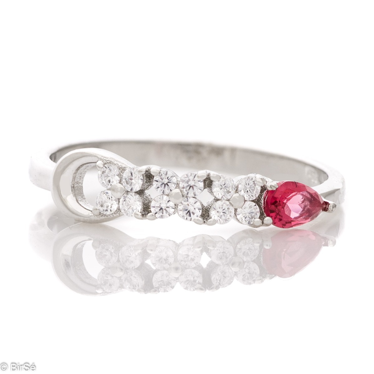 Elegant women's ring with exquisite rhodium-plated silver and radiant ruby ​​drop, in the company of sparkling zircons.