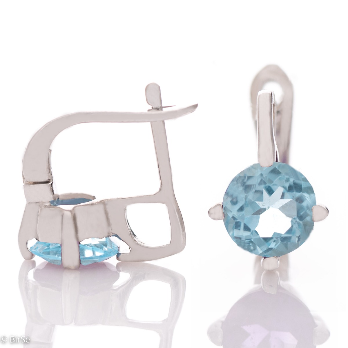 The soft blue glow of a natural blue topaz stone, complemented by the sparkle of rhodium silver - our new ladies' English clasp earrings with exquisite craftsmanship. In an exclusive ring and pendant set.