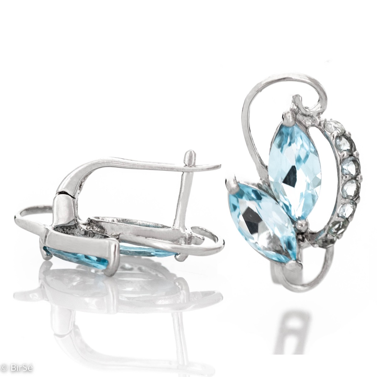 Shine bright with the rhodium silver and stunning blue topaz silver earrings set. The earrings have an English clasp and come complete with an irresistible ring and pendant.