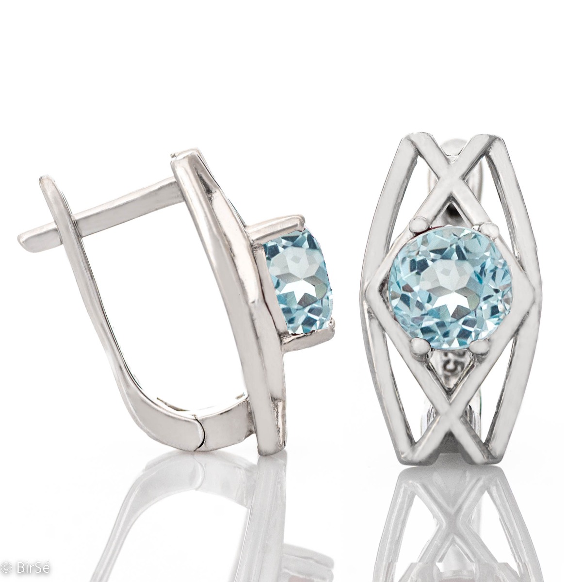 Elegant and sparkling - the earrings made of rhodium silver and natural blue topaz are the dream jewelry for every stylish lady.