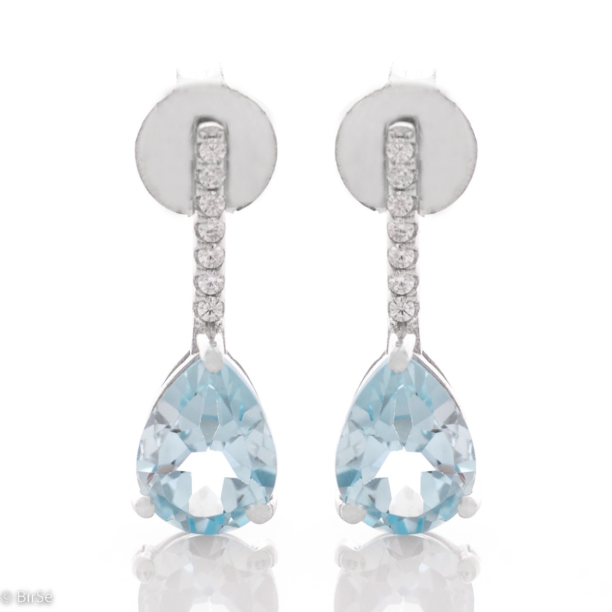 The beauty of azure blue in lovely sterling silver earrings with natural blue topaz and enchanting zircons.